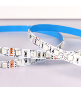 Coiled RGB LED strip with blue adhesive: A partially uncoiled RGB LED strip showing its blue adhesive backing