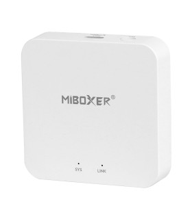 White MiBoxer 2.4GHz Gateway: Compact white gateway with the logo on the front, featuring rounded corners and minimal buttons.