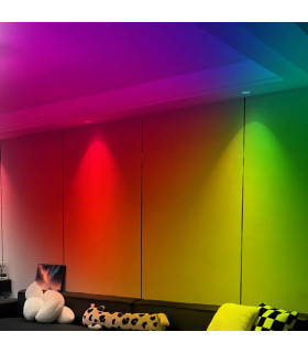 MiBoxer 6W RGB+CCT LED downlight illuminating a room with vibrant colour-changing lighting.