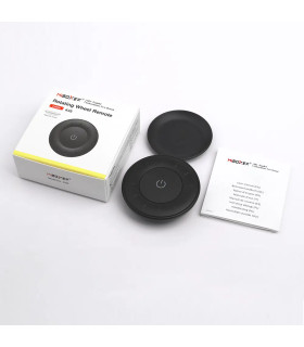 Top view of the MiBoxer Rotating Wheel Remote (K3S) in black, featuring a central power button