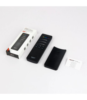 MiBoxer C6 remote control with packaging, holder, and instruction manual displayed.