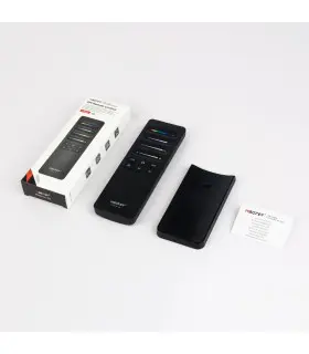 MiBoxer C6 remote control with packaging, holder, and instruction manual displayed.