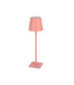 Pink table lamp with slim stand and square base, designed for outdoor use.