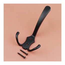 Black hook with mounting screws displayed on a peach background