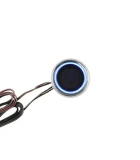 Top view of the Design Light push-button dimmer showing its round, sleek design and compact wiring.