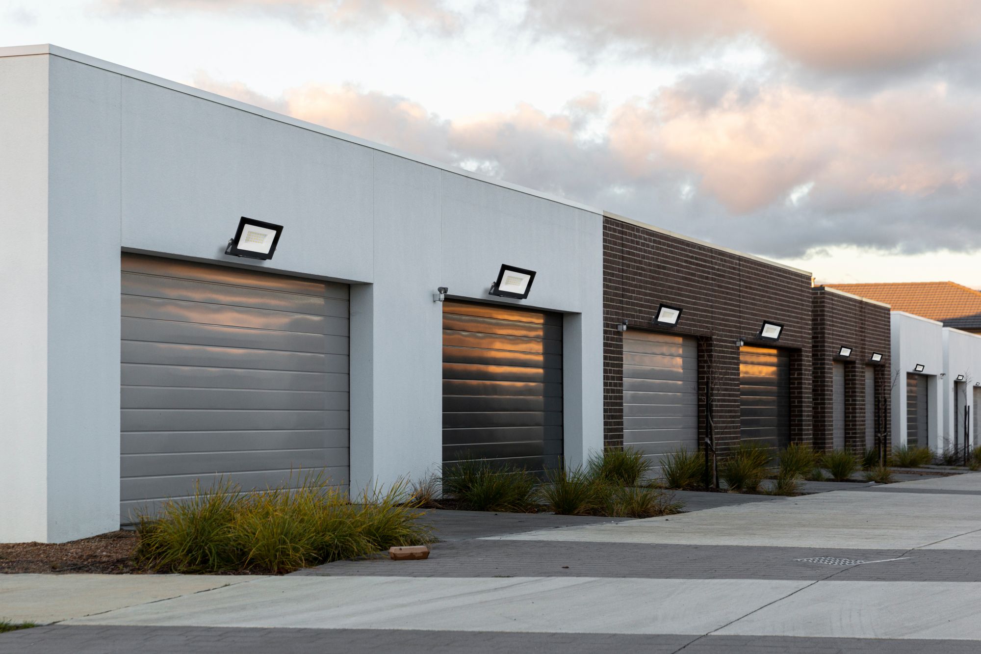 Lumino floodlights in action, installed on a garage wall