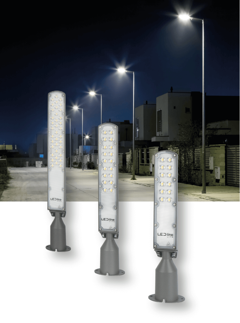 Three LED Line® Flamingo outdoor fixtures installed on a street at night, illuminating the surroundings with bright, energy-efficient light.